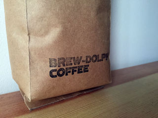 Close up of the stamped name on the front of the bag