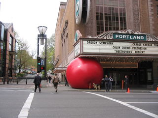 Photo of the red ball under a building