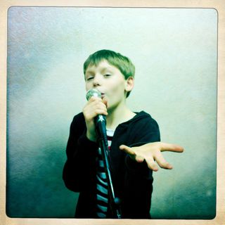 Photo of a boy singing